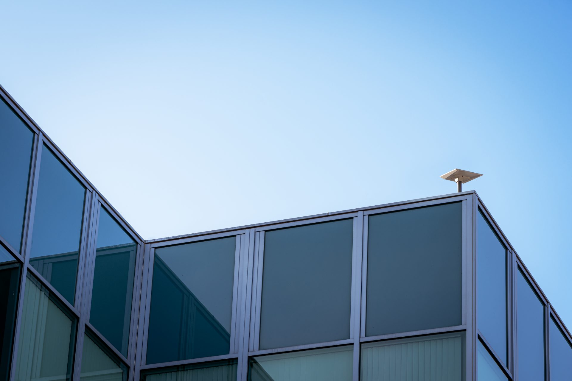 Starlink fixed business terminal on a commercial building